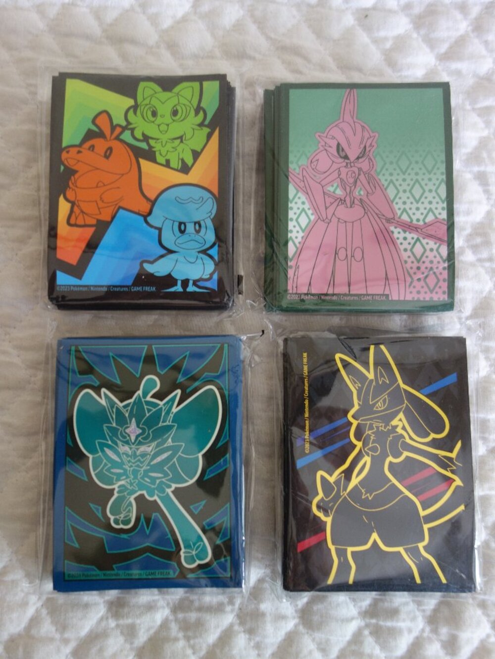 (e)	Lot of 4 NIP 65 count ea POKEMAN Trading Card Sleeves